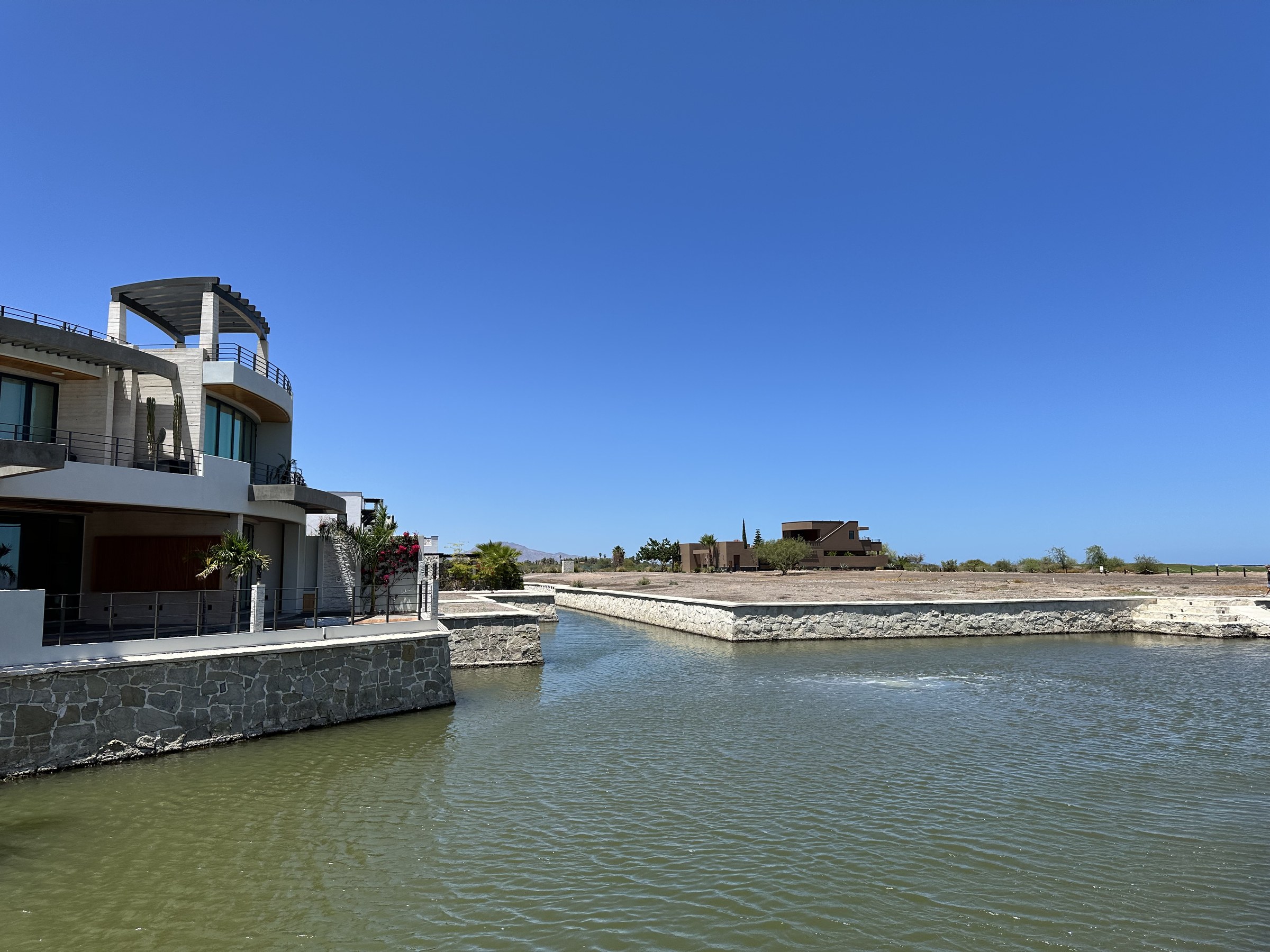 Neighbor canal-front home in Agua Viva