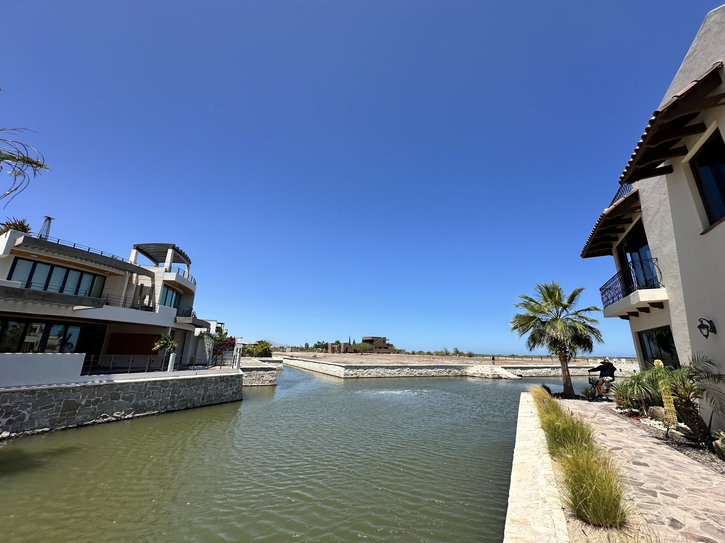Wide canal vista with Agua Viva villas on both sides